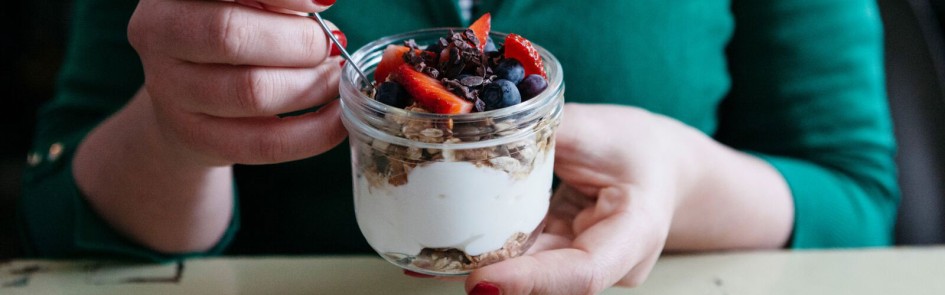 woman eating yoghurt